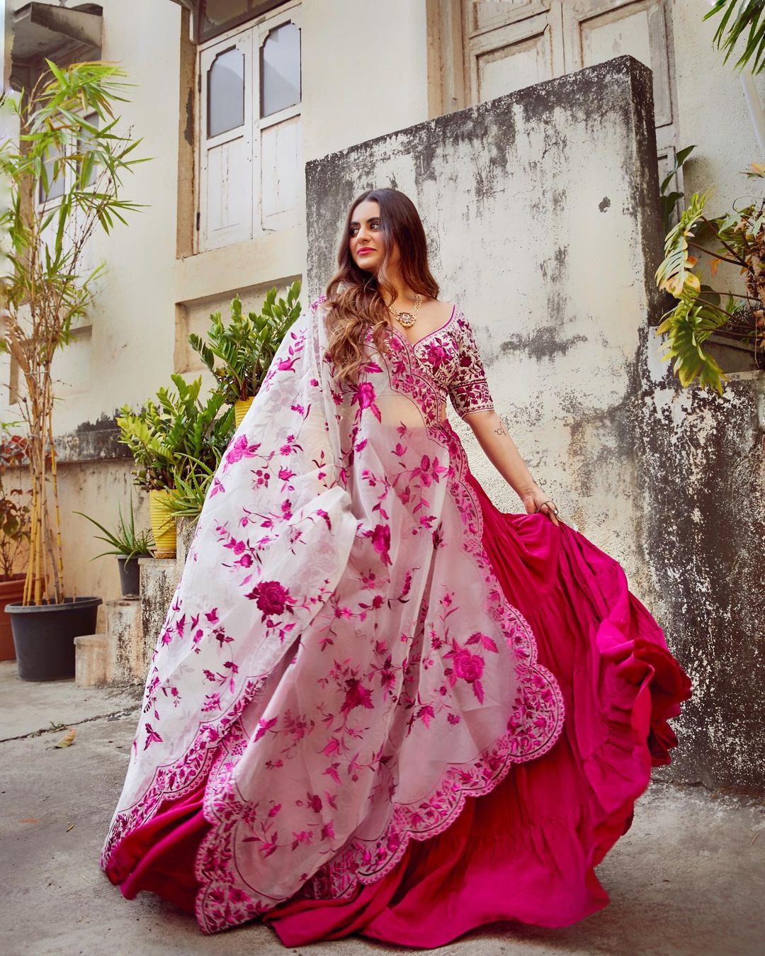 Shereen Sikka looks stunning in this Pink lehenga with Roses embroidered scalloped dupatta.